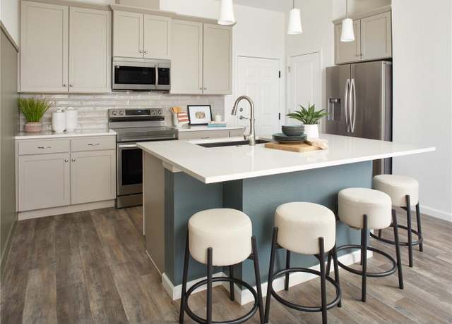 Property at 6153 N Ceylon St #102, Denver, CO 80249, 3 beds, 2 baths