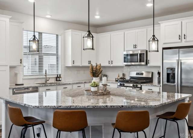 Property at 8403 Rush Creek Ave, Littleton, CO 80125, 3 beds, 3 baths