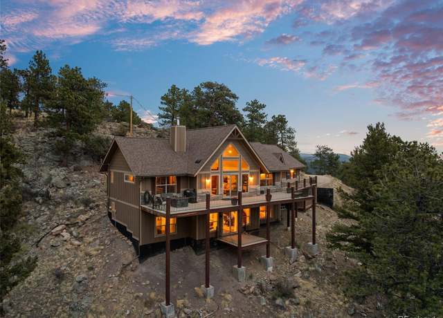 Property at 854 Dick Mountain Dr, Bailey, CO 80421, 4 beds, 4 baths