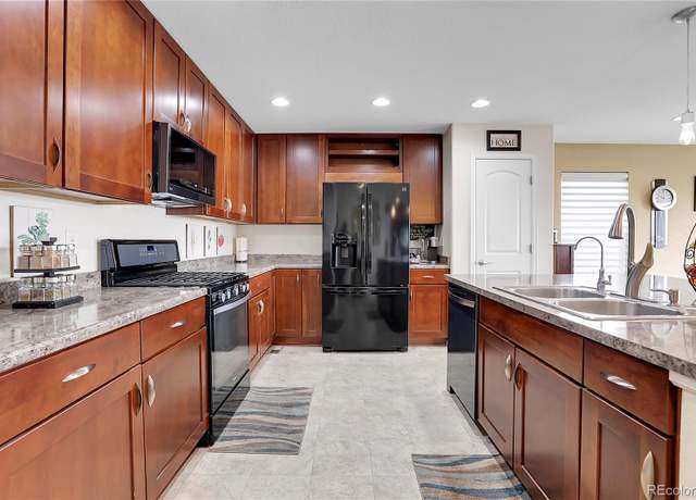 Property at 9868 Olathe St, Commerce City, CO 80022, 3 beds, 3 baths