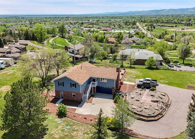 Property at 7930 Alkire St, Arvada, CO 80005, 4 beds, 3 baths