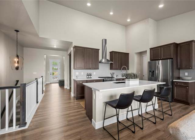 Property at 8244 S Queen St, Littleton, CO 80127, 3 beds, 3 baths