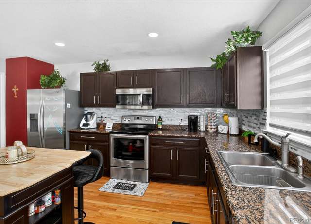 Property at 5420 S Shawnee Way, Aurora, CO 80015, 4 beds, 4 baths