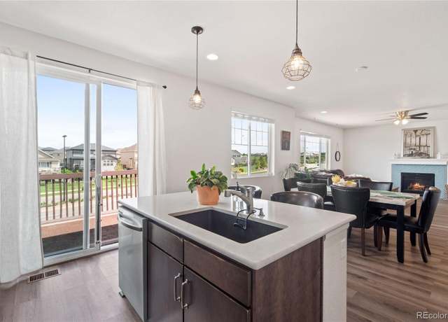 Property at 7410 S Old Hammer Way, Aurora, CO 80016, 4 beds, 3 baths