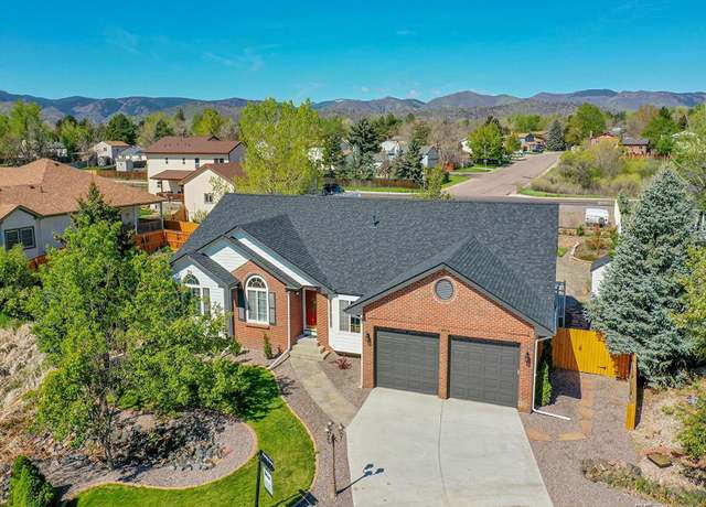 Property at 7809 S Flower St, Littleton, CO 80128, 5 beds, 4 baths