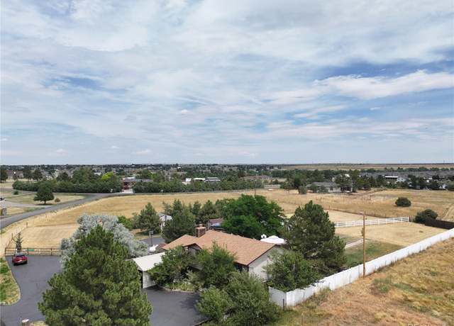 Property at 876 S Buchanan St, Aurora, CO 80018, 4 beds, 2 baths