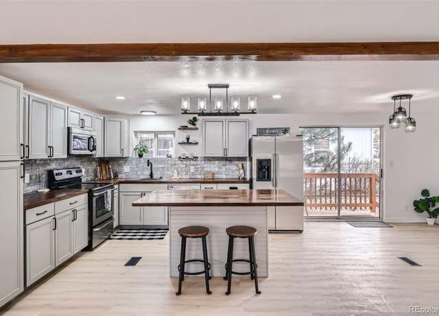 Property at 728 Flamingo Dr, Lafayette, CO 80026, 4 beds, 2 baths