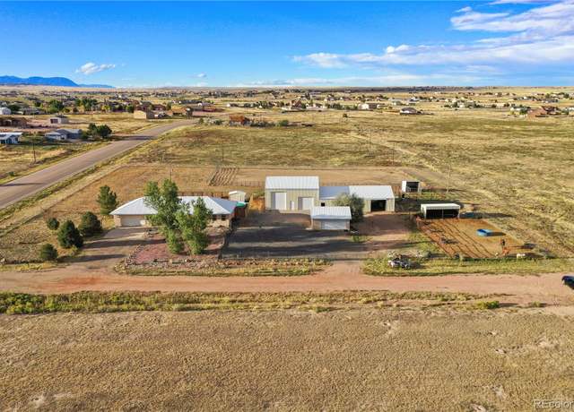 Property at 1211 E Dove Creek Dr, Pueblo, CO 81007, 5 beds, 3 baths