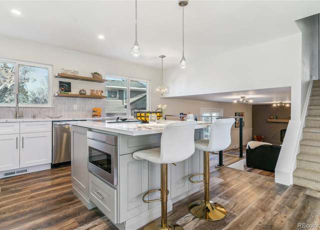 Property at 7649 E Amherst Ave, Denver, CO 80231, 4 beds, 4 baths