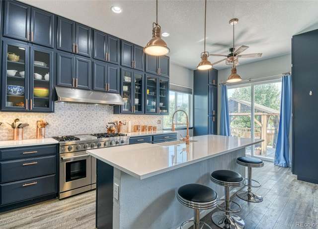 Property at 6049 N Fundy St, Aurora, CO 80019, 4 beds, 3 baths