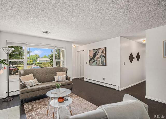 Property at 64 Nome Way Unit A, Aurora, CO 80012, 3 beds, 2 baths