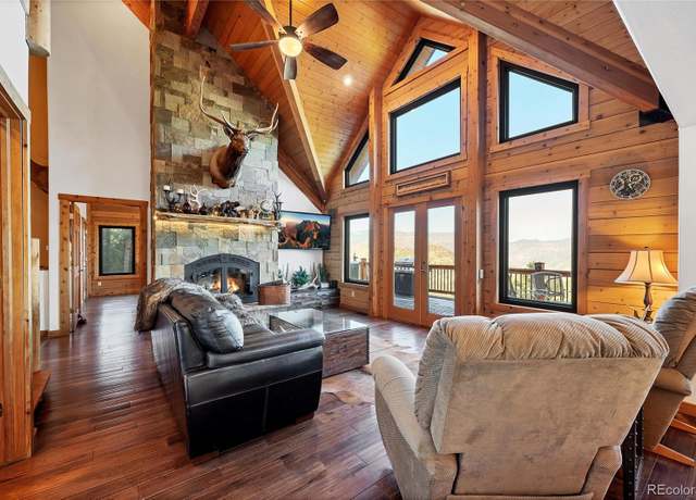 Property at 1055 Saddleback Dr, Evergreen, CO 80439, 4 beds, 4 baths