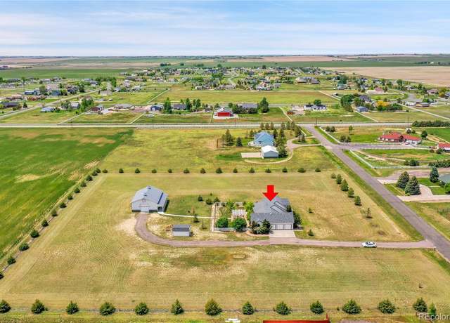 Property at 56920 E 42nd Ct, Strasburg, CO 80136, 3 beds, 4 baths