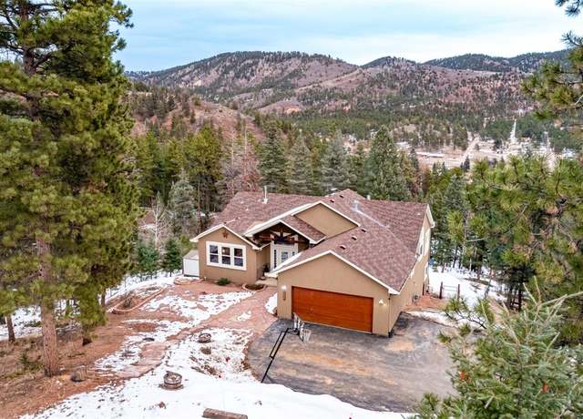 Property at 556 Crystola Ct, Woodland Park, CO 80863, 5 beds, 4 baths