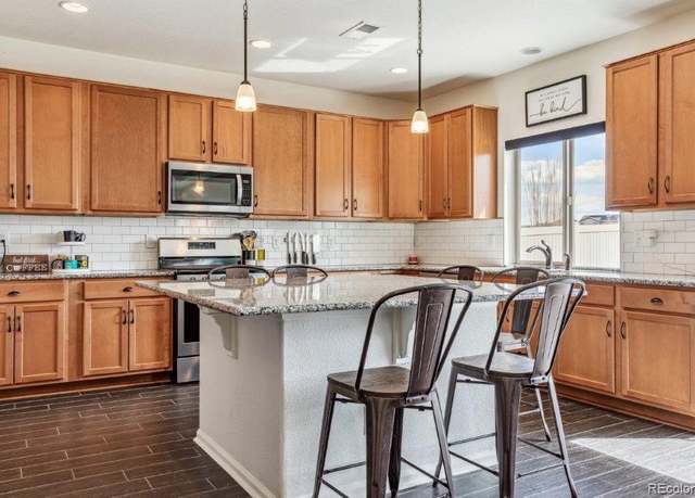 Property at 5352 Truckee St, Denver, CO 80249, 4 beds, 3 baths