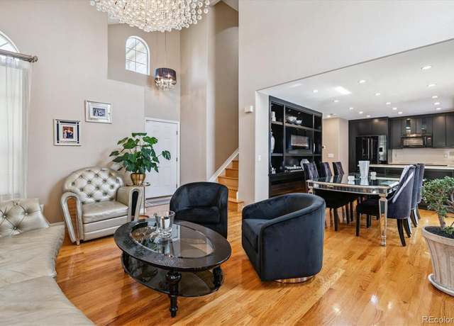Property at 9248 E Louisiana Pl, Denver, CO 80247, 4 beds, 4 baths