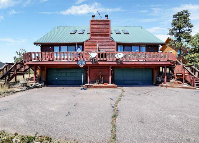 Property at 900 Ponderosa Way, Woodland Park, CO 80863, 4 beds, 4 baths