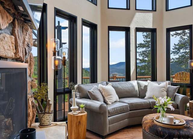 Property at 1194 Snyder Mountain Rd, Evergreen, CO 80439, 4 beds, 4 baths