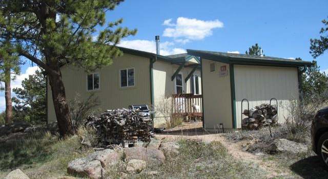 Photo of 187 Bear Claw Way, Red Feather Lakes, CO 80545