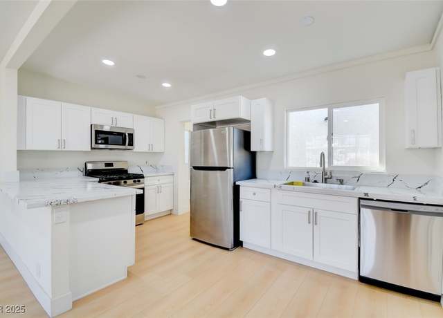 Property at 1405 Oakwood Ave, North Las Vegas, NV 89030, 4 beds, 3 baths