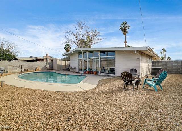 Property at 2496 Golfers St, Las Vegas, NV 89142, 4 beds, 2 baths