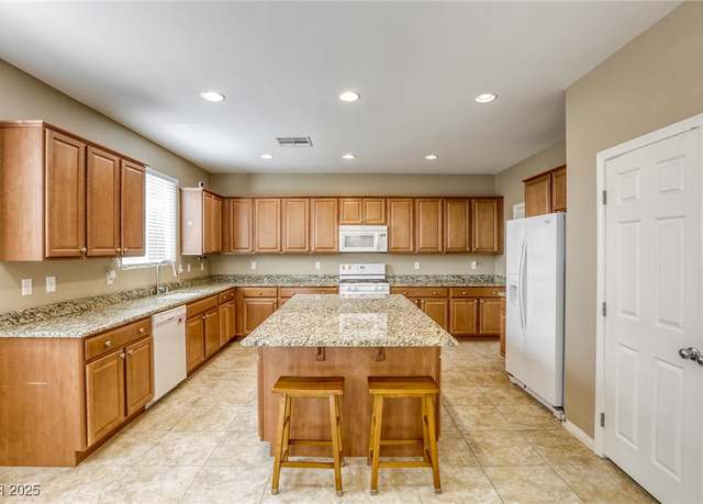 Property at 10537 Hamdem Ave, Las Vegas, NV 89129, 3 beds, 2.5 baths