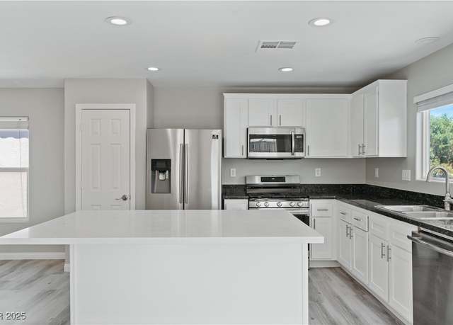 Property at 5116 Iron Crossing Ave, Las Vegas, NV 89131, 4 beds, 2.5 baths