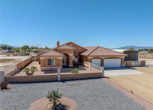 Property at 2411 W Bluebird Ave, Pahrump, NV 89060, 4 beds, 3 baths