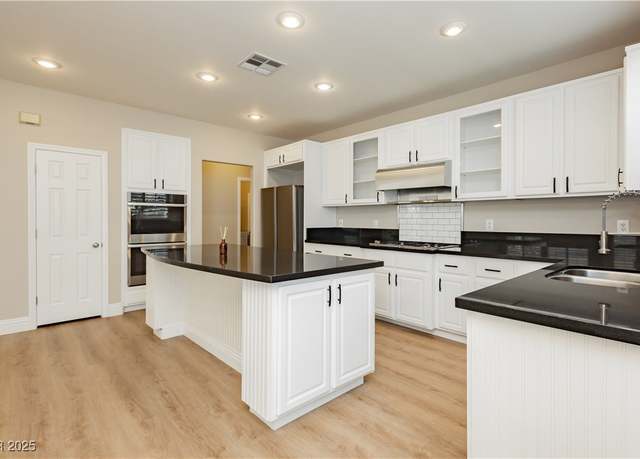 Property at 405 Fynn Valley Dr, Las Vegas, NV 89148, 4 beds, 2.5 baths