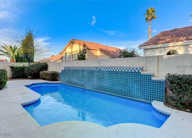 Property at 1700 Wandering Winds Way, Las Vegas, NV 89128, 5 beds, 3 baths
