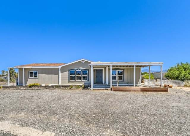 Property at 1800 Heritage Dr, Pahrump, NV 89048, 5 beds, 4 baths
