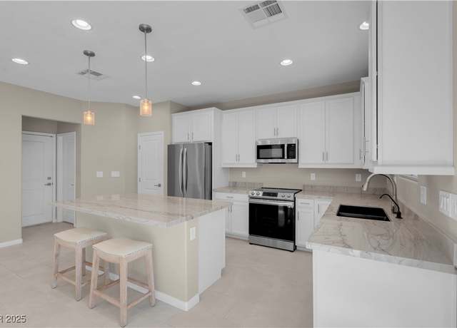Property at 7104 Stockton Dunes St, North Las Vegas, NV 89084, 2 beds, 2.5 baths