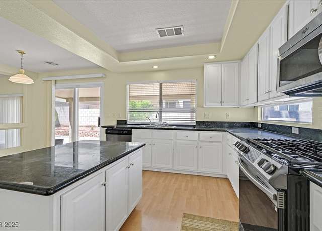 Property at 9746 Driftwood Island Ct, Las Vegas, NV 89148, 5 beds, 3 baths
