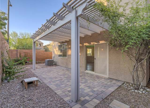 Property at 7605 Lake Fork Peak St, Las Vegas, NV 89166, 5 beds, 3 baths