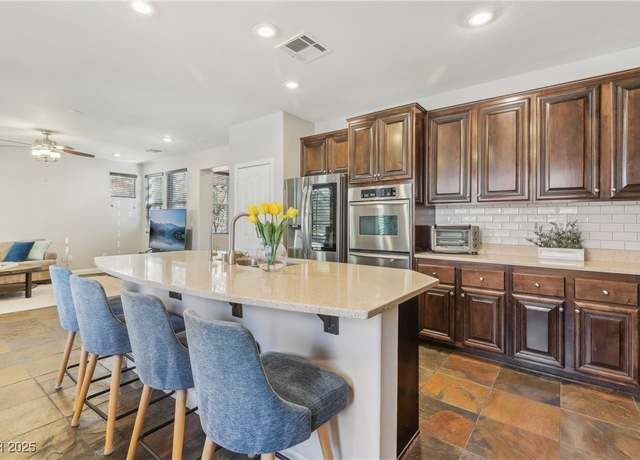 Property at 605 Bachelor Button St, Las Vegas, NV 89138, 3 beds, 2.5 baths