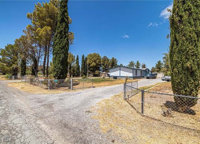 Property at 1140 Vondell Dr, Pahrump, NV 89048, 4 beds, 2 baths