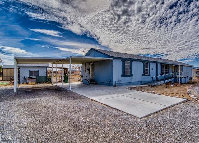 Property at 4961 E Comanche Dr, Pahrump, NV 89061, 4 beds, 2 baths