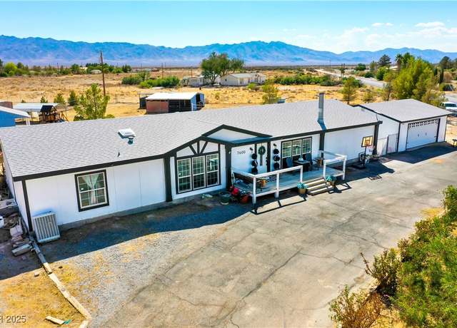 Property at 7600 S Pioneer Ln, Pahrump, NV 89061, 4 beds, 3 baths