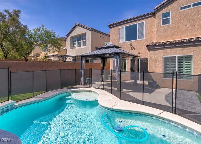 Property at 10241 Headrick Dr, Las Vegas, NV 89166, 4 beds, 2.5 baths