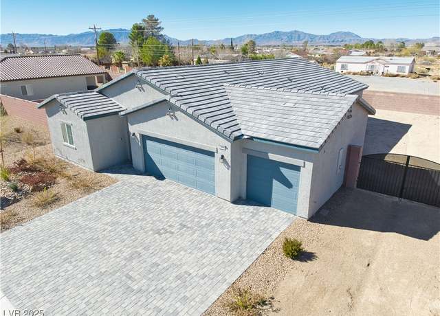 Property at 1580 S Outlaw St, Pahrump, NV 89060, 4 beds, 2 baths