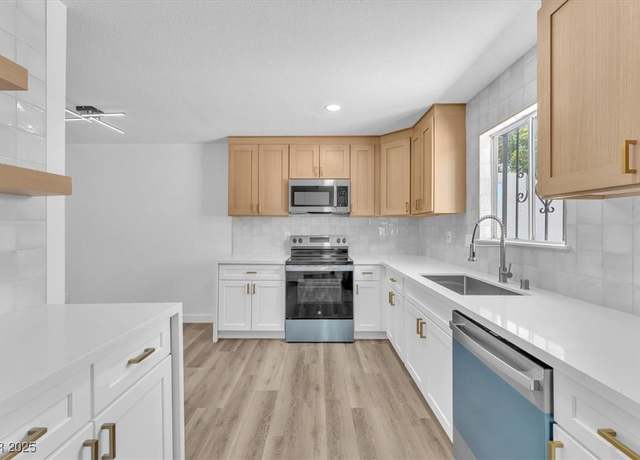 Property at 747 Greenbriar Townhouse Way, Las Vegas, NV 89121, 2 beds, 2.5 baths