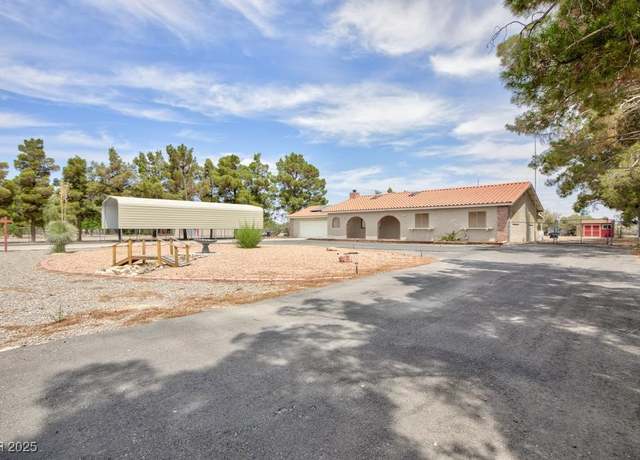 Property at 1050 Morgan Ln, Pahrump, NV 89060, 3 beds, 2 baths