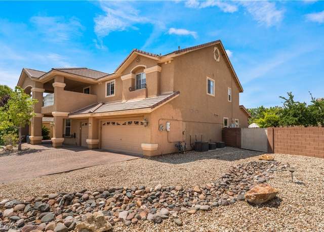 Property at 5872 Revital Ct, Las Vegas, NV 89131, 5 beds, 3 baths