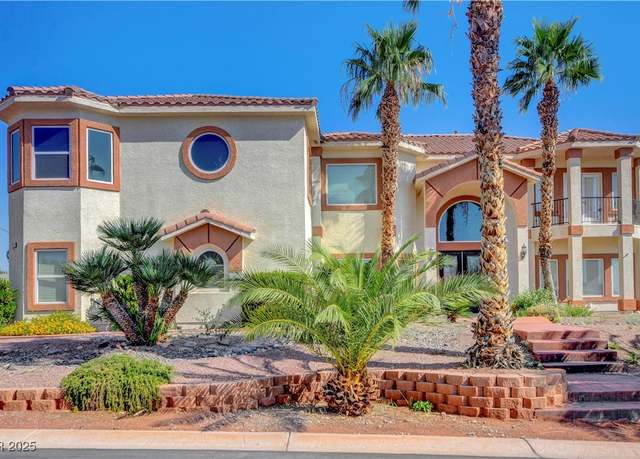 Property at 6695 N Grand Canyon Dr, Las Vegas, NV 89149, 5 beds, 4 baths