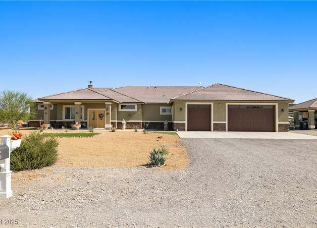 Property at 3600 E Bridger St, Pahrump, NV 89061, 4 beds, 3.5 baths