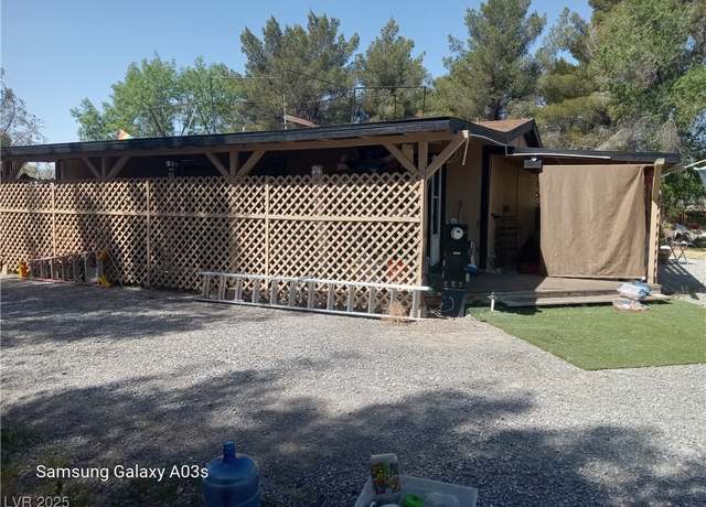 Property at 1240 Vondell Dr, Pahrump, NV 89048, 3 beds, 2 baths