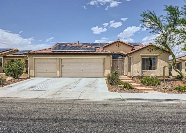 Property at 3220 W Hammer Ln, North Las Vegas, NV 89031, 4 beds, 3 baths