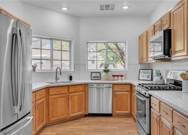 Property at 9047 Harbor Wind Ave, Las Vegas, NV 89178, 4 beds, 2.5 baths