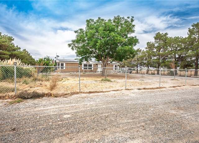 Property at 4700 E Comanche Dr, Pahrump, NV 89061, 3 beds, 2 baths
