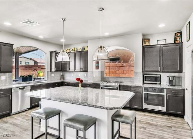 Property at 5976 Rockway Glen Ave, Las Vegas, NV 89141, 4 beds, 3.5 baths